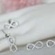 #infinity #wedding #bridal #bridesmaids #sparkle #artdeco #jewelry #clearcrystal #swarovski #rhinestone #necklace #earrings #gift #chic