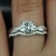 Tressa 14kt White Gold Cushion FB Moissanite And Diamonds Twist Wedding Set(Other Metals And Stone Options Available)