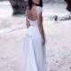 Capped sleeves, low scooped back with rosette trim and train. French lace and silk chiffon wedding dress - New