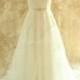 Backless A line tulle lace wedding dress with elegant beading sash
