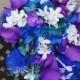 Cascading bridal bouquet, teal, purple, blue hydrangeas, dedrobium orchids, stephanotis, ostrich feather accent