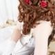 red bridal hairpiece