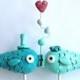 Aqua and Teal Kissing Fish wedding cake topper for your beach wedding as seen in Real Maine Weddings magazine