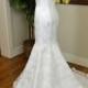 Ivory alencon lace wedding dress with keyhole back in mermaid shape