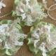 3 shabby chic lace and fabric handmade flowers green and ivory colors.