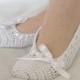 White bridal wedding dance slippers or comfortable home slippers