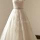 Open back Ivory a line lace wedding dress with illusion neckline and beads sash