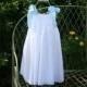Flower Girl dress with  Satin Bows. Fully lined dress......Available in sizes .5..6..7..8..10