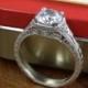 Vintage Style Halo Engagement Ring mounted in Sterling Silver with Cubic ZIrconia (1.31 CTS)