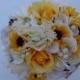 Country bridesmaid bouquet in white hydrangea, sunflowers and navy hydrangea blossoms