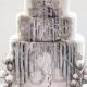 This Winter-themed Wedding Cake Features Two Sets Of Footprints Receding Into A Hand-painted Aspen Forest. See More Of T...