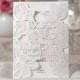 Floral laser cut ivory wedding invitation card