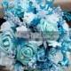 Frozen Disney themed winter wedding bouquet with turquoise white aqua teal and silver glitter accents and snowflakes