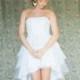Short white strapless wedding dress, tiered asymmetric tulle wedding dress