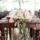 Wooden Tables With Garland Centerpiece