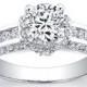 Ladies platinum pave and channel diamond engagement ring 0.66 ctw G-VS2 wih 1ct Round White Sapphire Center