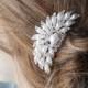 Beautiful silver color hair comb with sparkling rhinestones