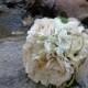 Bridal bouquet in cream hydrangea and roses