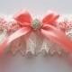 Wedding Garter Ivory Lace Over Coral Satin with Rhinestone Centered Bow - The KIMBERLY Garter