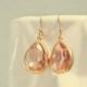 peach crystal gold teardrop earrings. gold earrings. simple gemstone drops. gem dangle. apricot. bridal jewelry