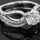 18k White Gold "Infinity" Diamond Engagement Ring And Wedding Ring