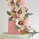 A Four-Tiered Cake With Cascading Flowers