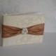 Lace Guest book with Copper sash with large pearl and crystal brooch