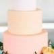 A White-and-Peach Three-Tiered Cake
