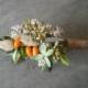 Boutonneire made in your choice of colors with dried flowers and herbs and twine covered stem.
