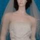 Two  Tier Fingertip Bridal Wedding Veil Center Gathered finished with a delicate pencil edge.