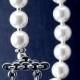 Pearl bracelet with double skulls: Swarovski pearl skull bracelet, goth jewelry, rockabilly wedding skull jewelry, white ivory black