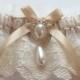 Wedding Garter in Ivory Lace on Champagne Band with Pearl and Crystal Detail - The MEREDITH Garter