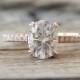 Oval Forever Brilliant Moissanite Solitaire Diamond Engagement Ring in 14K Rose Gold