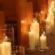 The Warm Glow Of Candlelight Creates A Romantic Effect Without The Use Of Flowers.
