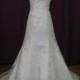 Sweetheart Lace Overylay Wedding Dress with Exquisit Embellishments.