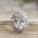 Oval White Sapphire & Diamond Halo Engagement Ring in 14K White Gold