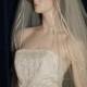 wedding bridal veil  3 Tier Fingertip length Graceful and Traditional finished with a tiny Satin Ribbon Trim