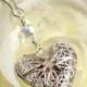 A heart shaped locket. Wedding bouquet & memorial charm, with filigree heart locket. Crystal or pearl bridal bouquet charm.