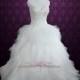 Strapless Princess Ball Gown Wedding Dress with Tulle Feather Ruffles and Sparkly Embroidery 