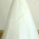 Open back ivory A line romantic lace tulle wedding dress with deep V cutting