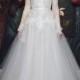 Illusion lace bateau neck long sleeves tulle ball gown wedding dress