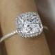 Cushion cut Diamond halo engagement ring. Charles Colvard Forever Brilliant moissanite.