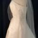 Cascading Waterfall style wedding veil featuring a sprinkling of  Swarovski Crystals