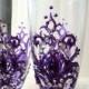 Wedding champagne glasses with a fleur-de-lis decoration in purple with silver crystals, bridesmaids toasting flutes