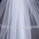Brand New  1 tier Classic style veil . Elbow lenght with silver comb ready to wear