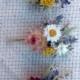 Dried flowers on bobby pin.  For some color and whimsy to your hair.