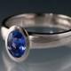 Oval Chatham Blue Sapphire Bezel Solitaire Engagement Ring in Palladium, Lab Created Sapphire Ring