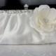 Ivory satin bridal blutch purse with flower