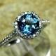 AAAA London Blue Topaz 7.00 mm Round Natural (1.50ct) 14K white gold Halo ring with .30 carats of diamonds