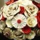 the Cara bridal bouquet in red and wine mixed paper roses, book page roses spiral roses and pinwheel fan folded flowers